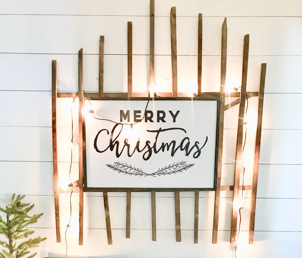 Merry Christmas sign on wooden gate