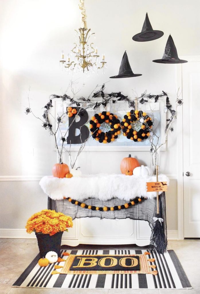 Halloween entryway with floating witch hats