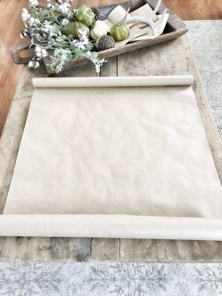 blank scroll sign on table