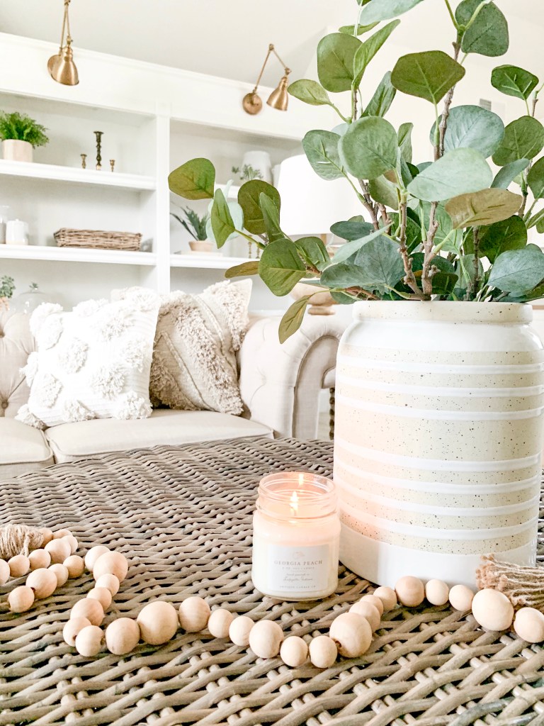 candle burning on coffee table