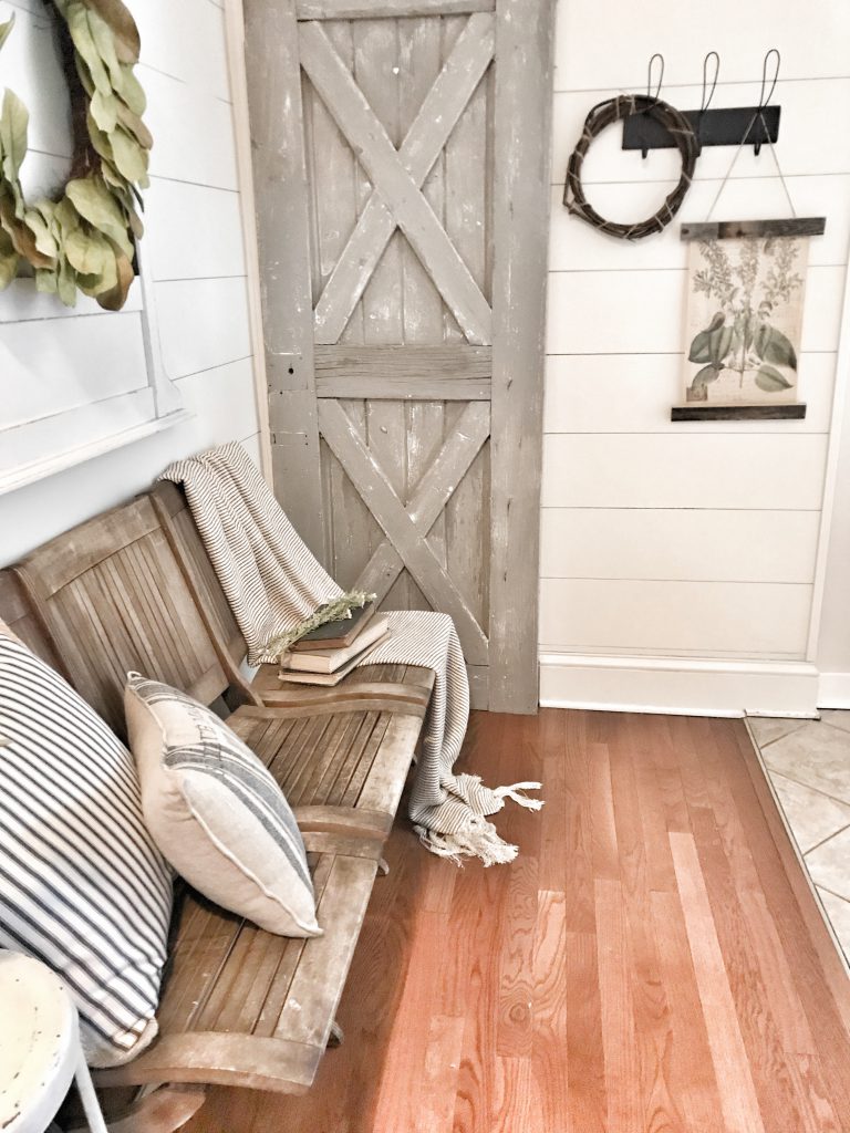 wood poster frame DIY hanging on shiplap wall