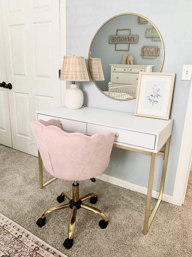 white desk with pink chair in girl's room